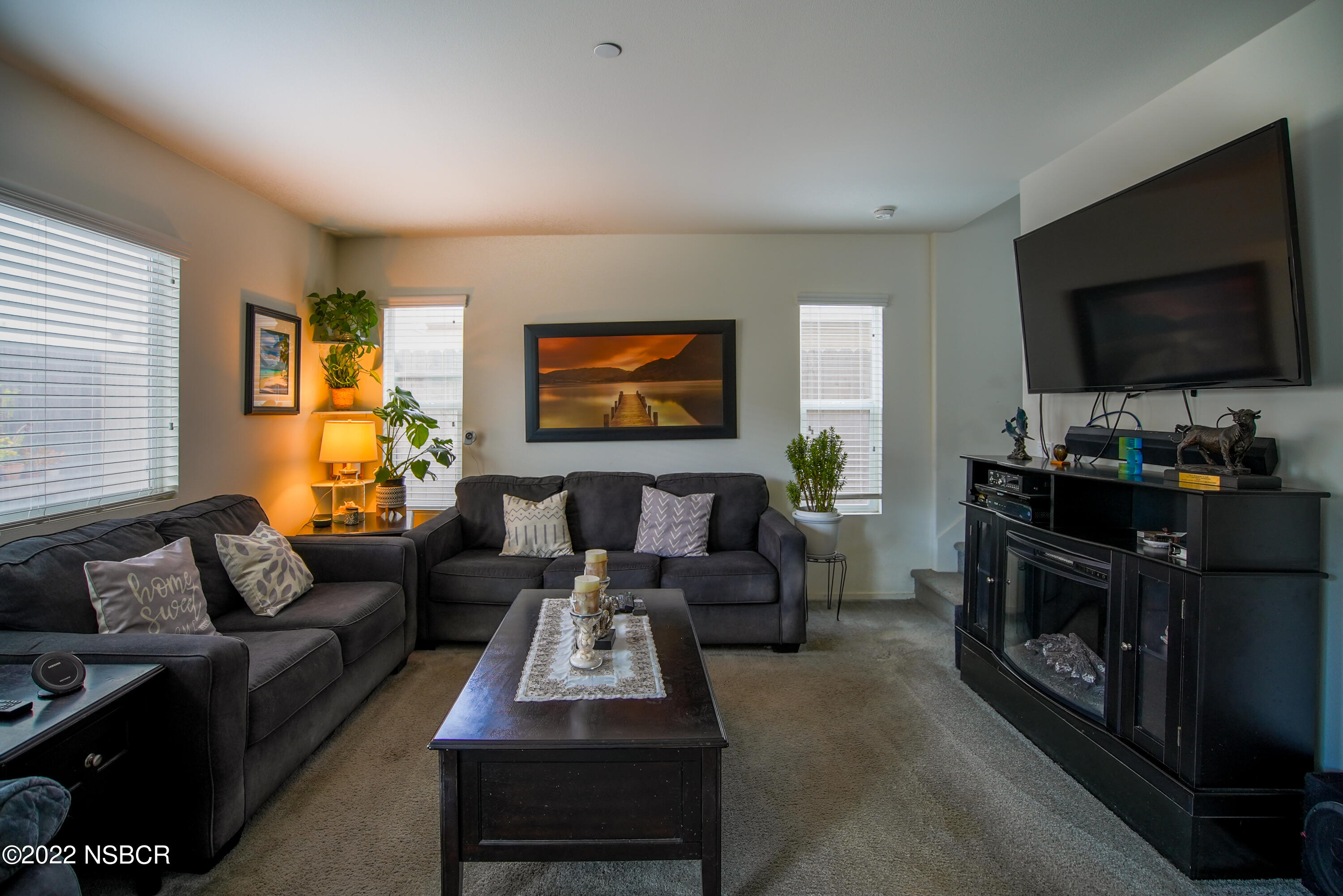 1307 Crown Circle Lompoc, CA 93436 - Photo 5 of 34 a living room with furniture and a flat screen tv