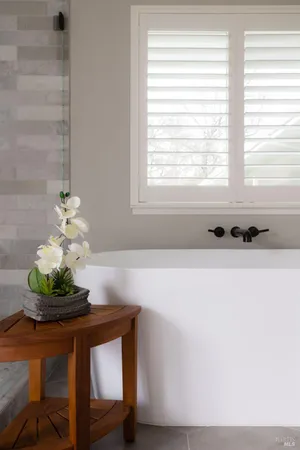 a view of a dinning table and chairs in the patio
