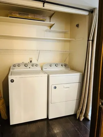 a utility room with dryer and washer