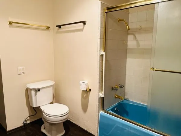 a bathroom with a sink and a shower