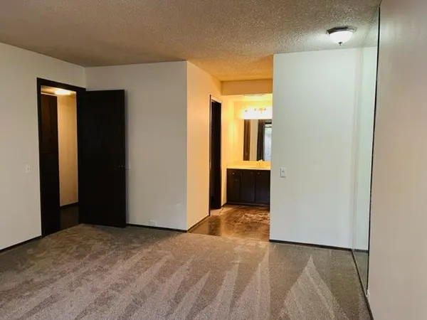 a view of a room with a bathroom and a sink