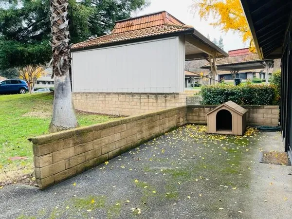 a house with trees in the background