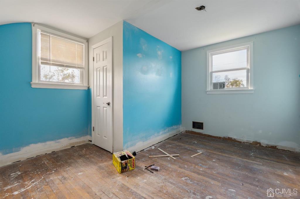 212 Huff Avenue Manville, NJ 08835 - Photo 11 of 22 an empty room with windows