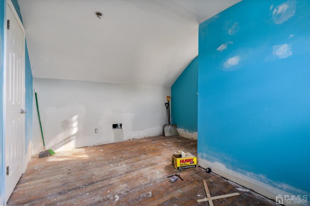212 Huff Avenue Manville, NJ 08835 - Photo 13 of 22 a view of storage and utility room with empty room