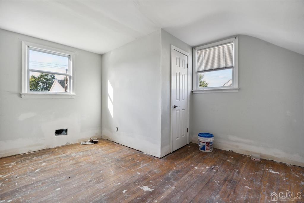 212 Huff Avenue Manville, NJ 08835 - Photo 14 of 22 a view of room with window and hallway