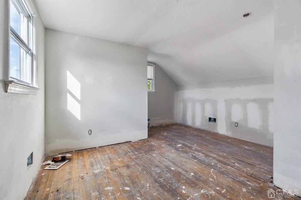 212 Huff Avenue Manville, NJ 08835 - Photo 16 of 22 a view of an empty room and window