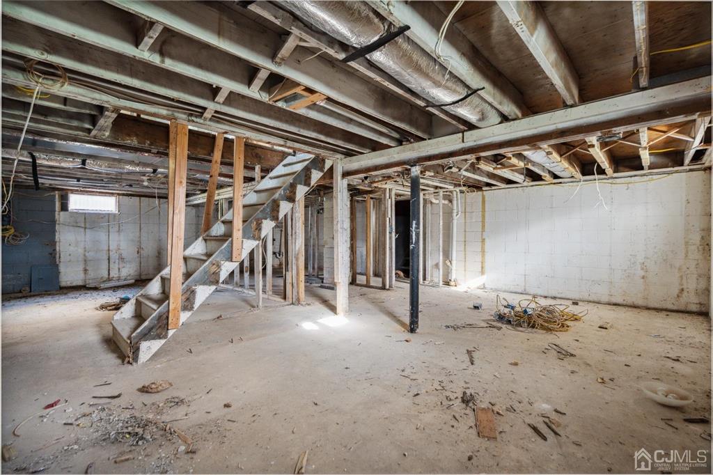 212 Huff Avenue Manville, NJ 08835 - Photo 17 of 22 a view of a room with wooden walls