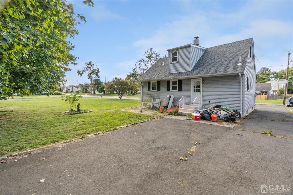 212 Huff Avenue Manville, NJ 08835 - Photo 22 of 22 a childrens park with lots of swings and slides