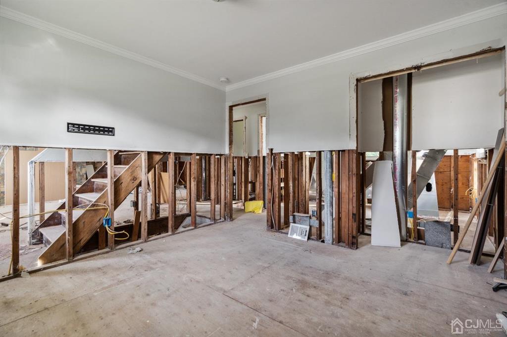 212 Huff Avenue Manville, NJ 08835 - Photo 3 of 22 a view of walk in closet with clothes