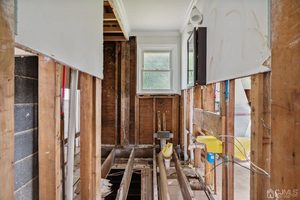212 Huff Avenue Manville, NJ 08835 - Photo 4 of 22 a view of a balcony with furniture and floor to ceiling window