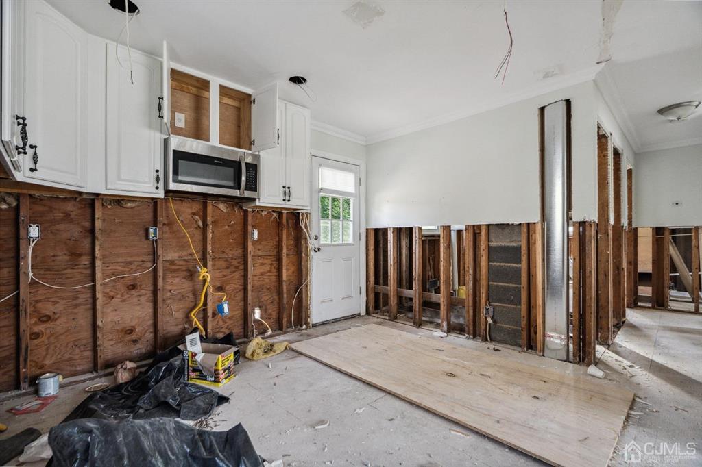 212 Huff Avenue Manville, NJ 08835 - Photo 8 of 22 a view of a room with gym equipment