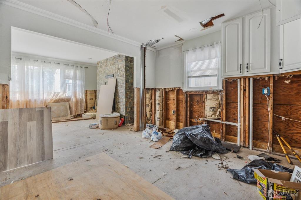 212 Huff Avenue Manville, NJ 08835 - Photo 9 of 22 a view of a room with gym equipment