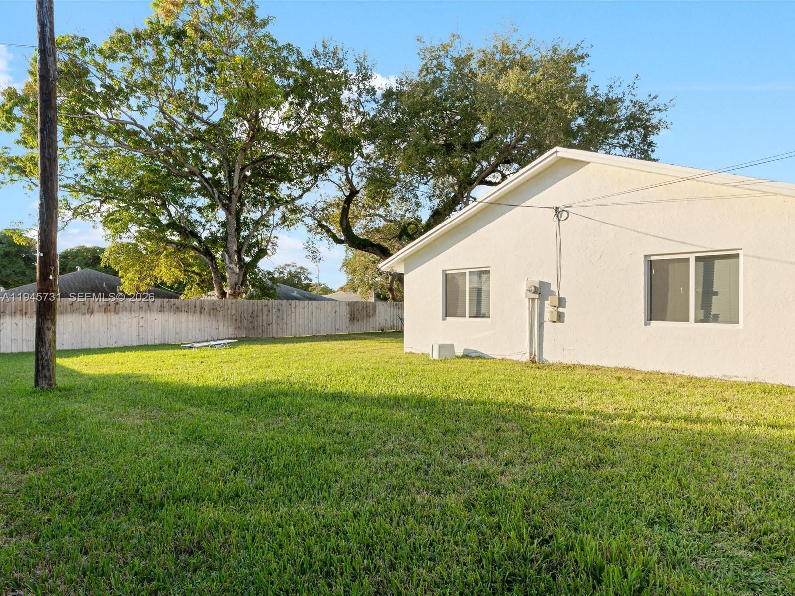 6510 Southwest 59th Place South Miami, FL 33143 - Photo 5 of 23 a view of a backyard of the house