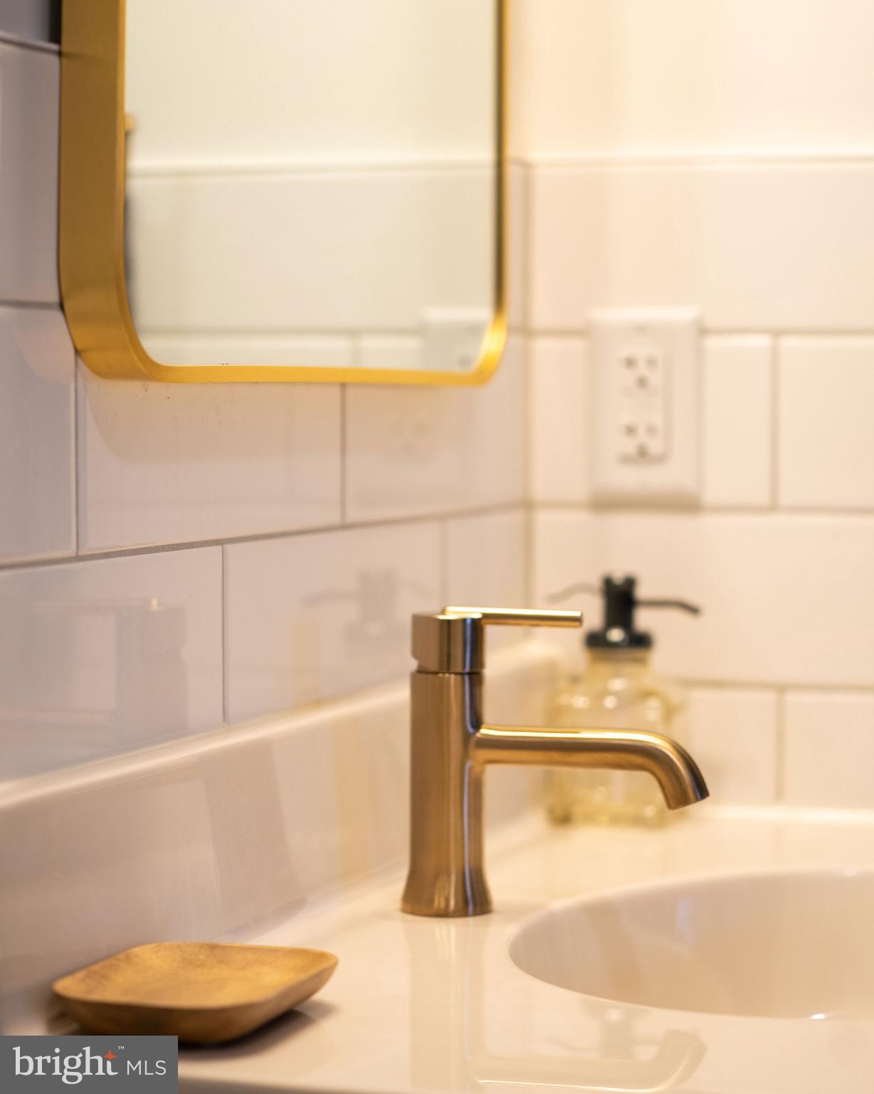 437 West Grant Street, Unit 304 Lancaster, PA 17603 - Photo 17 of 37 a bathroom with a sink and a bathtub