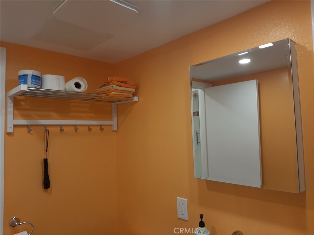 12592 Montecito Road, Unit 9 Seal Beach, CA 90740 - Photo 24 of 34 a bathroom with a shower