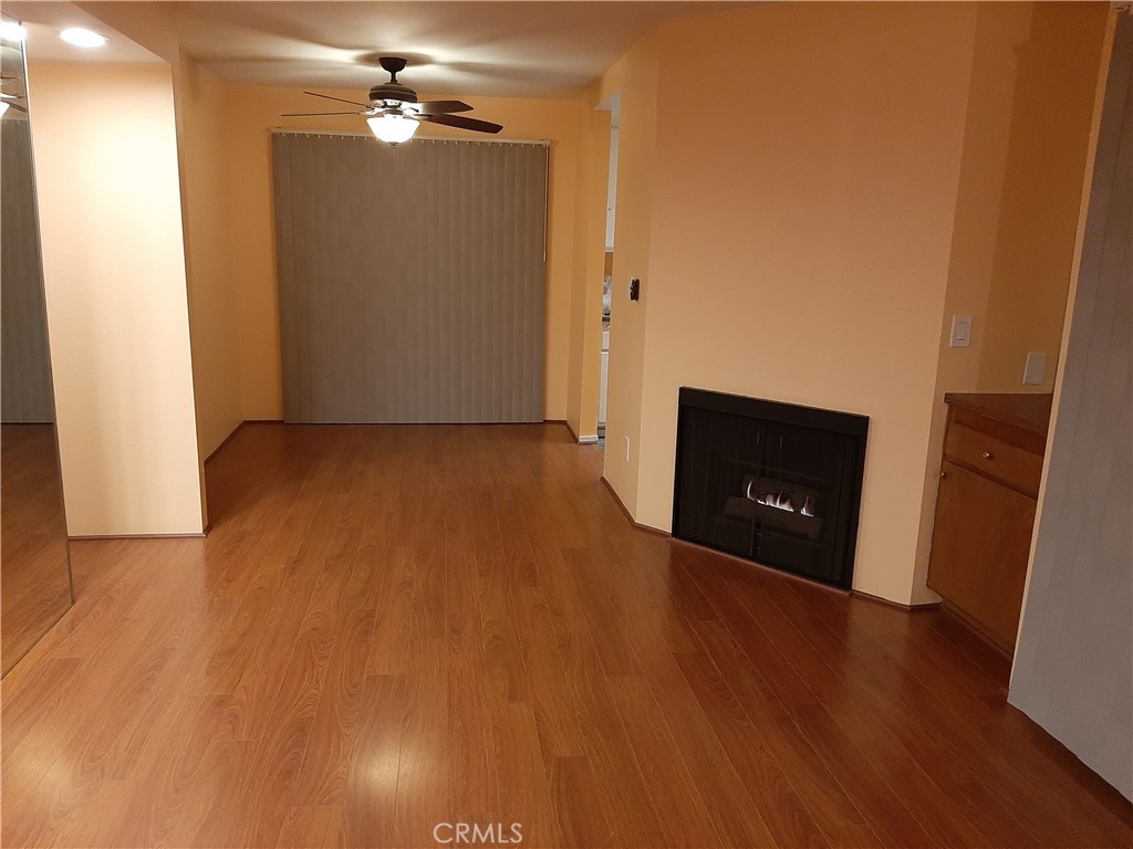 12592 Montecito Road, Unit 9 Seal Beach, CA 90740 - Photo 31 of 34 a view of a livingroom with a fireplace