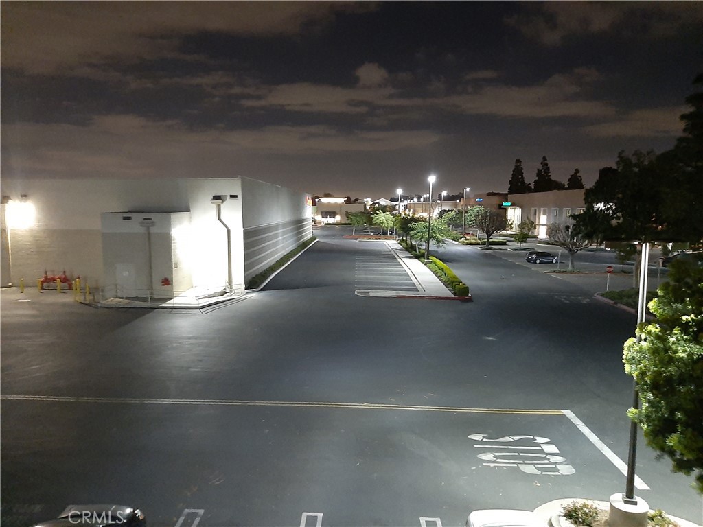 12592 Montecito Road, Unit 9 Seal Beach, CA 90740 - Photo 6 of 34 a view of a city street with a building