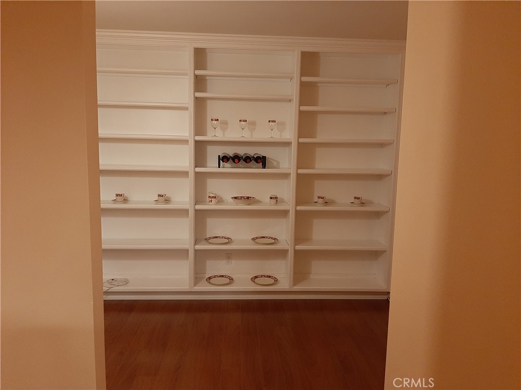 12592 Montecito Road, Unit 9 Seal Beach, CA 90740 - Photo 9 of 34 a view of a room with shelves