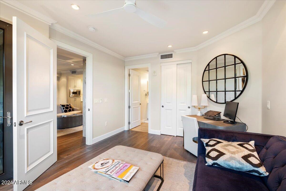 7175 East Camelback Road, Unit 107 Scottsdale, AZ 85251 - Photo 14 of 33 a living room with furniture and a wooden floor