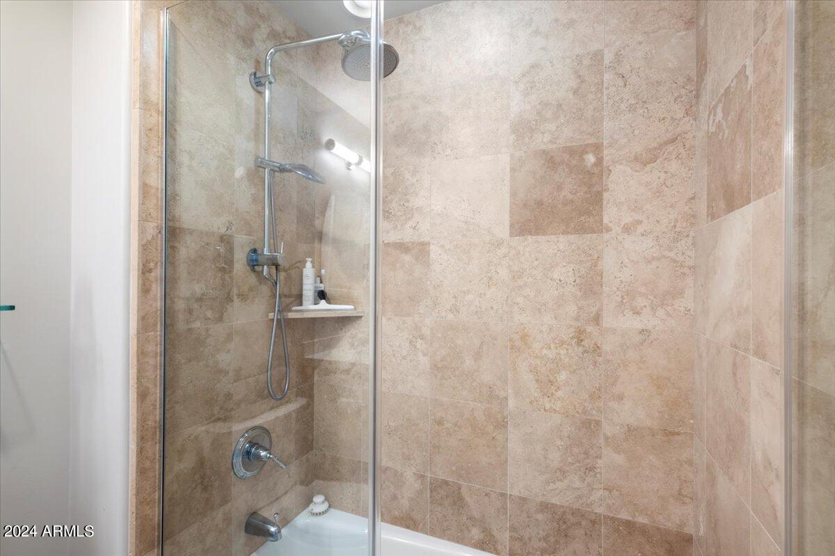7175 East Camelback Road, Unit 107 Scottsdale, AZ 85251 - Photo 16 of 33 a bathroom with a shower