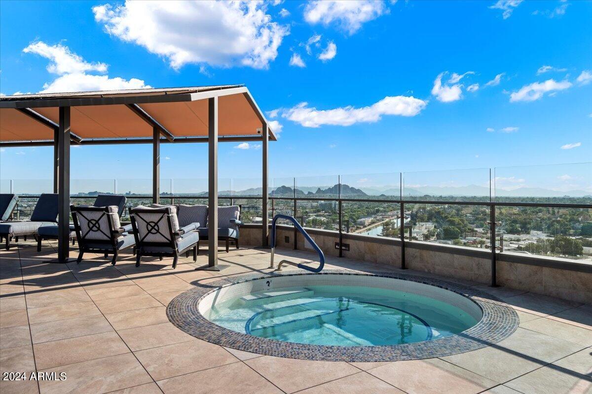 7175 East Camelback Road, Unit 107 Scottsdale, AZ 85251 - Photo 22 of 33 a view of a terrace with sitting area