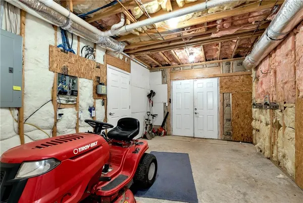 a picture of a bathroom with a white door