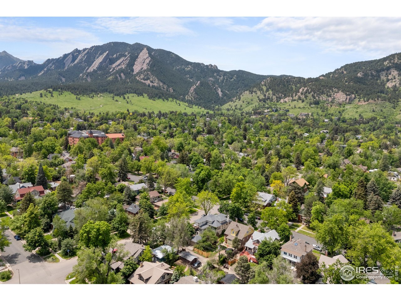 1020 10th Street Boulder, CO 80302 - Photo 38 of 38 a view of a lush green hillside and houses