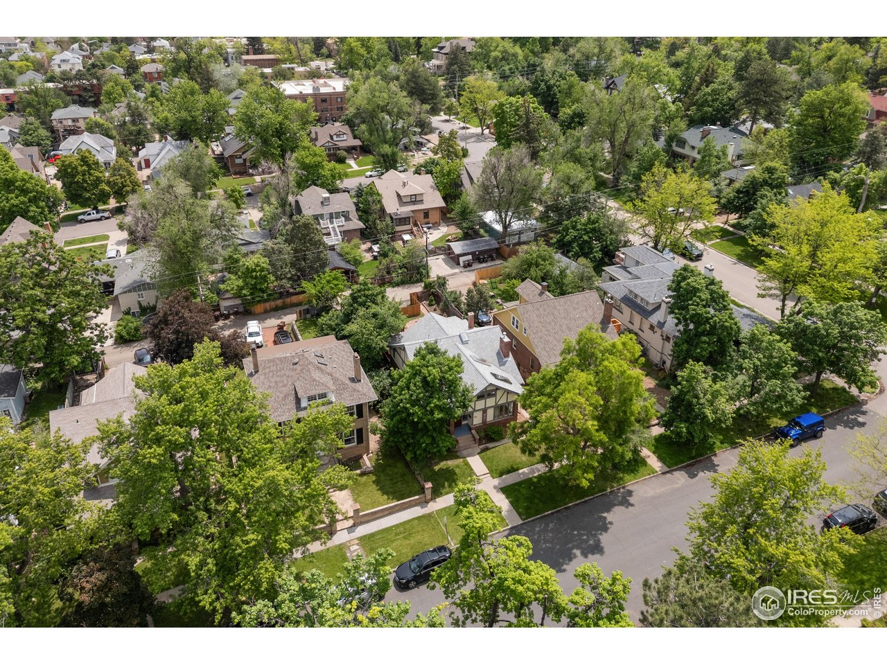 1020 10th Street Boulder, CO 80302 - Photo 6 of 38 an aerial view of residential house with outdoor space and trees all around