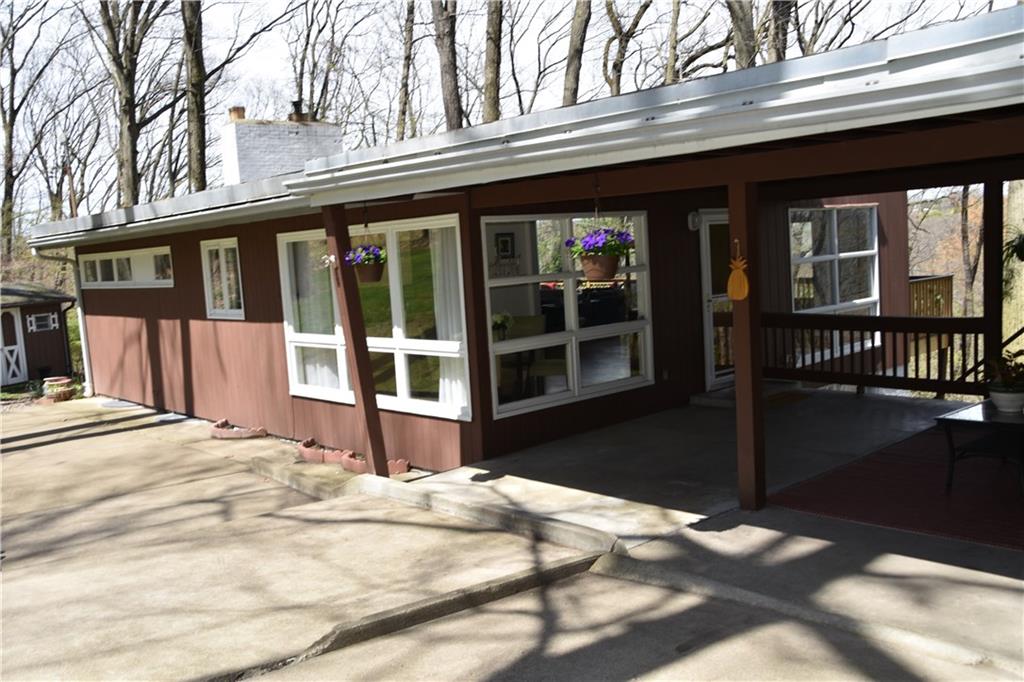 420 Highview Road Wexford, PA 15090 - Photo 1 of 25 Wait until you see the inside! This home is spectacular with so many windows that allow an abundance of natural lighting and views of the outdoors to come inside! Perfectly nestled in a private wooded setting.