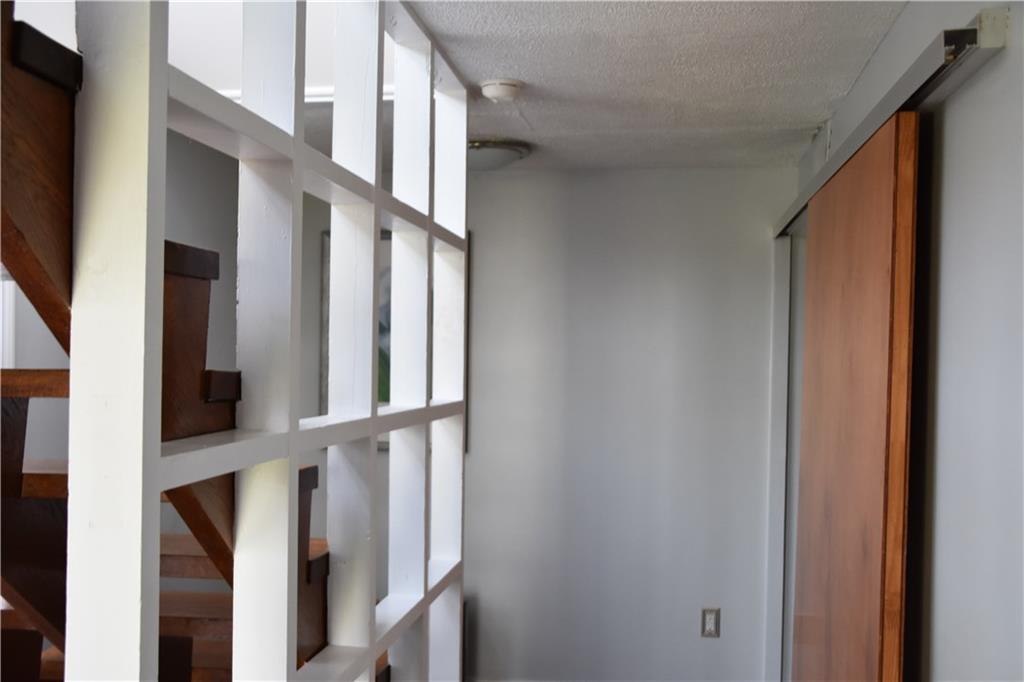 420 Highview Road Wexford, PA 15090 - Photo 14 of 25 Sliding barn- like door takes you to the lower level bedrooms