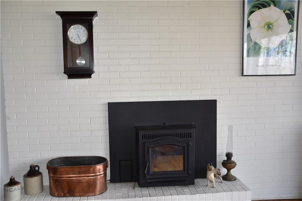 420 Highview Road Wexford, PA 15090 - Photo 4 of 25 The fire place has a pellet stove insert for additional efficient heating source!