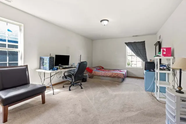 a view of a room with wooden walls