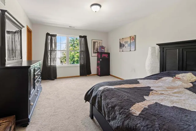 a view of a building with a yard