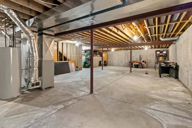 a swimming pool with outdoor seating and yard