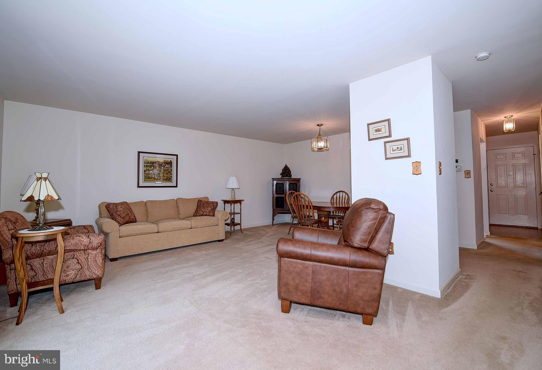 23 Offspring Court Perry Hall, MD 21128 - Photo 13 of 23 a living room with furniture and a couch