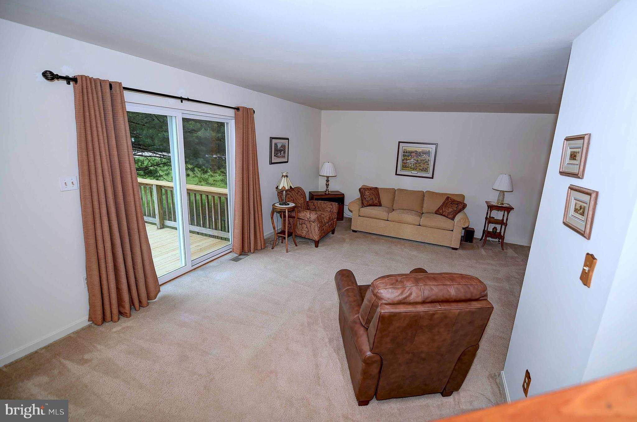 23 Offspring Court Perry Hall, MD 21128 - Photo 14 of 23 a living room with furniture and a window