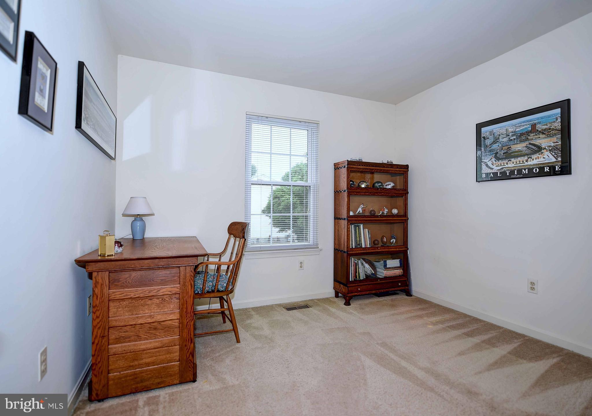23 Offspring Court Perry Hall, MD 21128 - Photo 17 of 23 a view of a workspace with furniture and cabinet