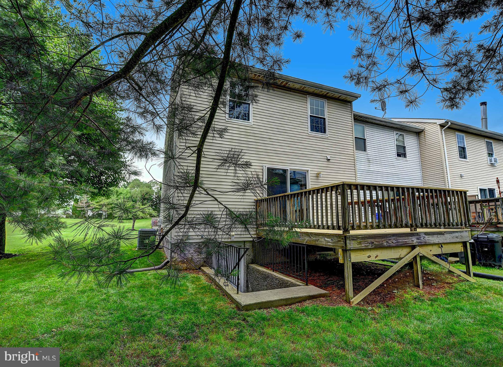 23 Offspring Court Perry Hall, MD 21128 - Photo 21 of 23 a view of a house with a yard and deck