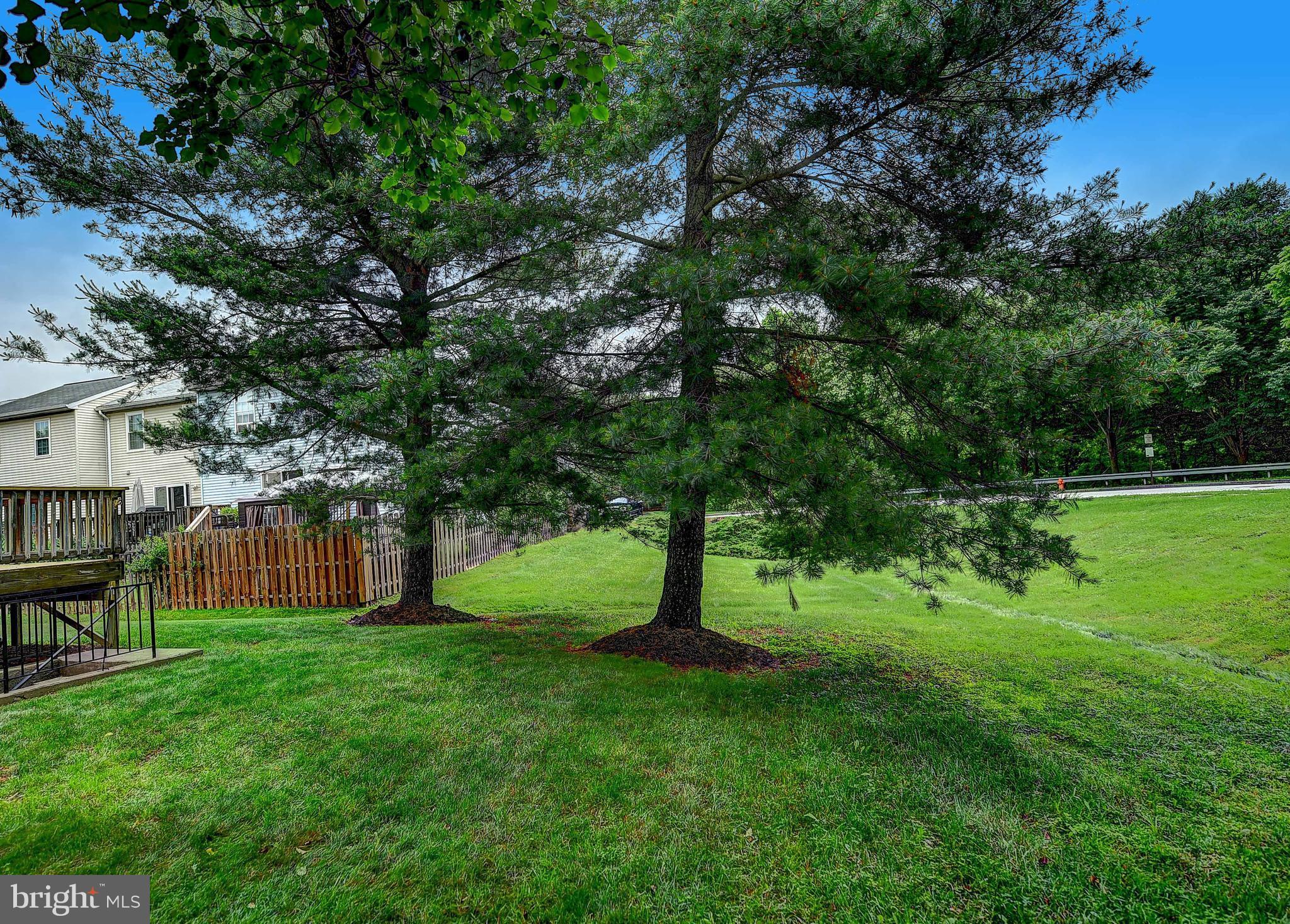 23 Offspring Court Perry Hall, MD 21128 - Photo 22 of 23 a view of green field with trees in the background