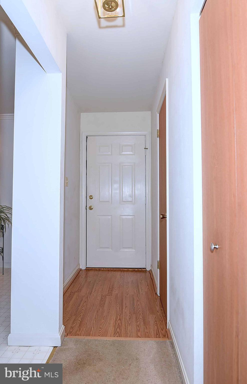 23 Offspring Court Perry Hall, MD 21128 - Photo 10 of 23 a view of a hallway with wooden floor