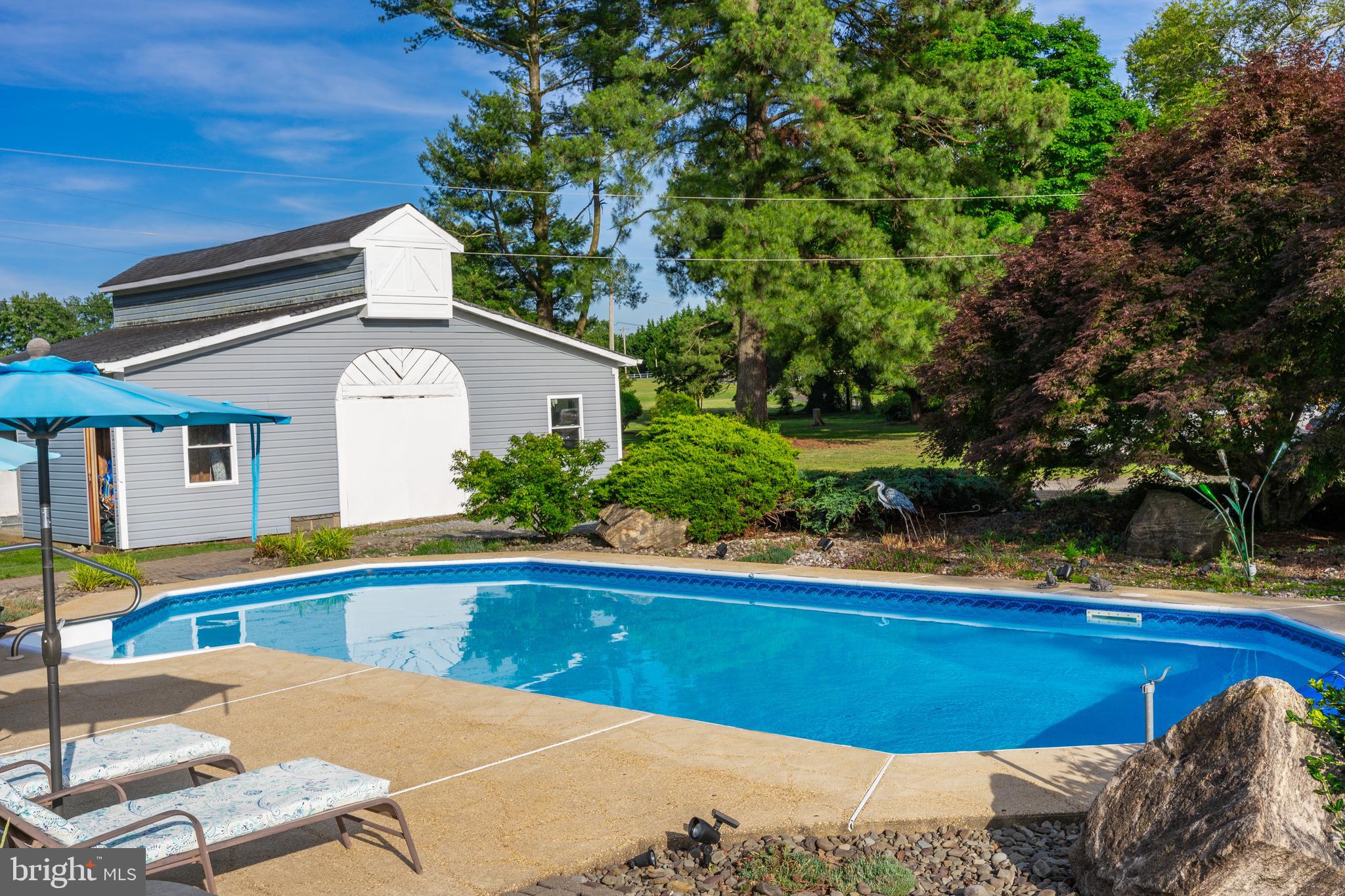 5365 Buena Vista Road Prince Frederick, MD 20678 - Photo 23 of 74 a view of a house with pool and chairs