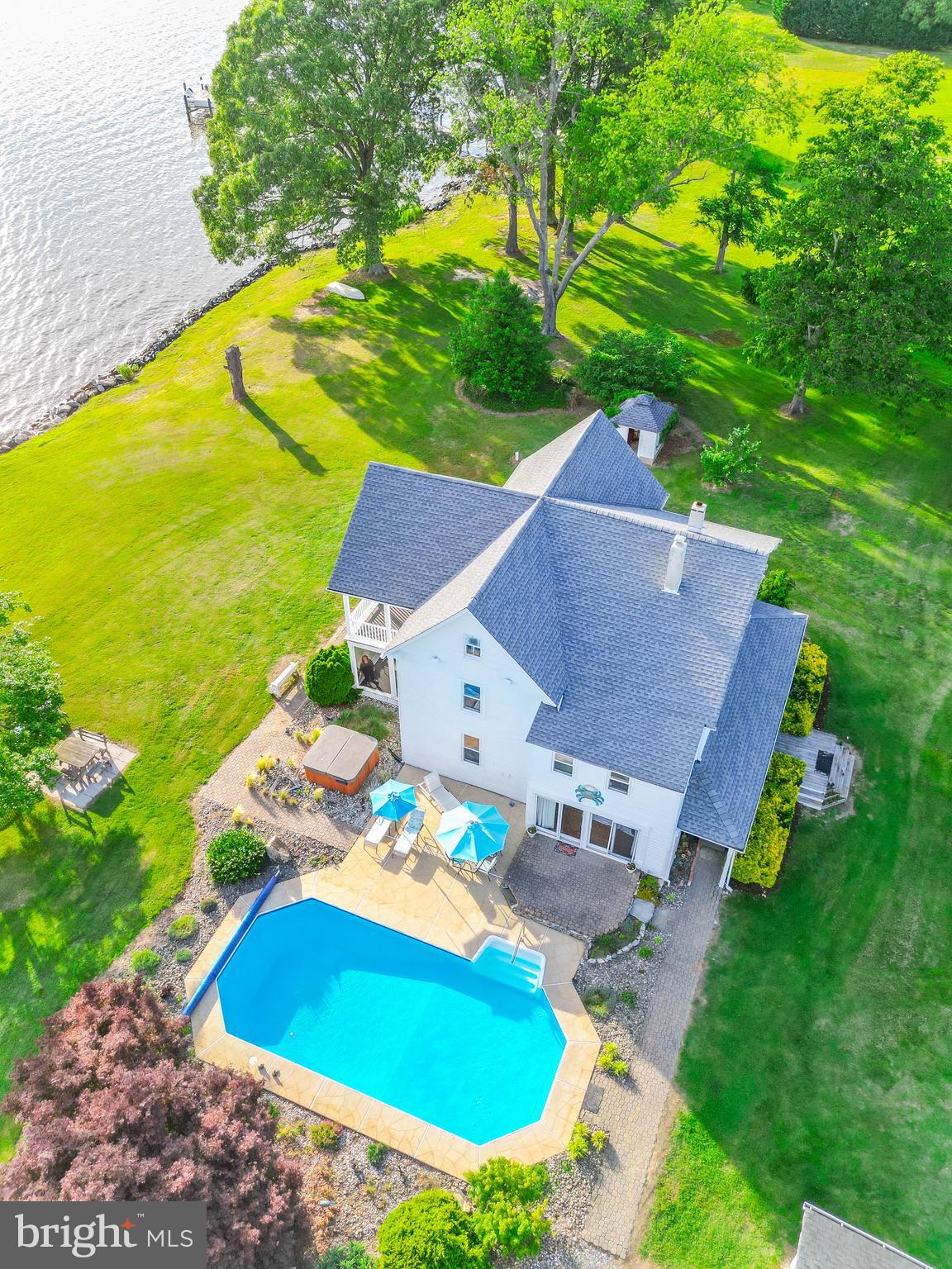 5365 Buena Vista Road Prince Frederick, MD 20678 - Photo 30 of 74 an aerial view of residential houses with outdoor space and swimming pool