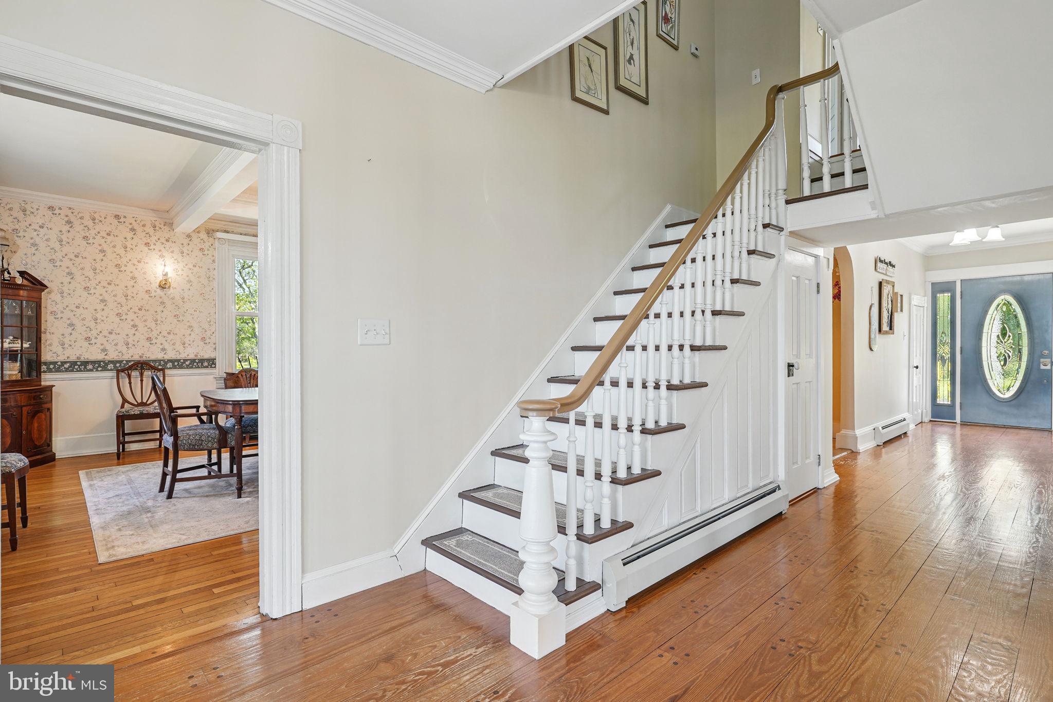 5365 Buena Vista Road Prince Frederick, MD 20678 - Photo 44 of 74 a view of entryway with stairs and wooden floor