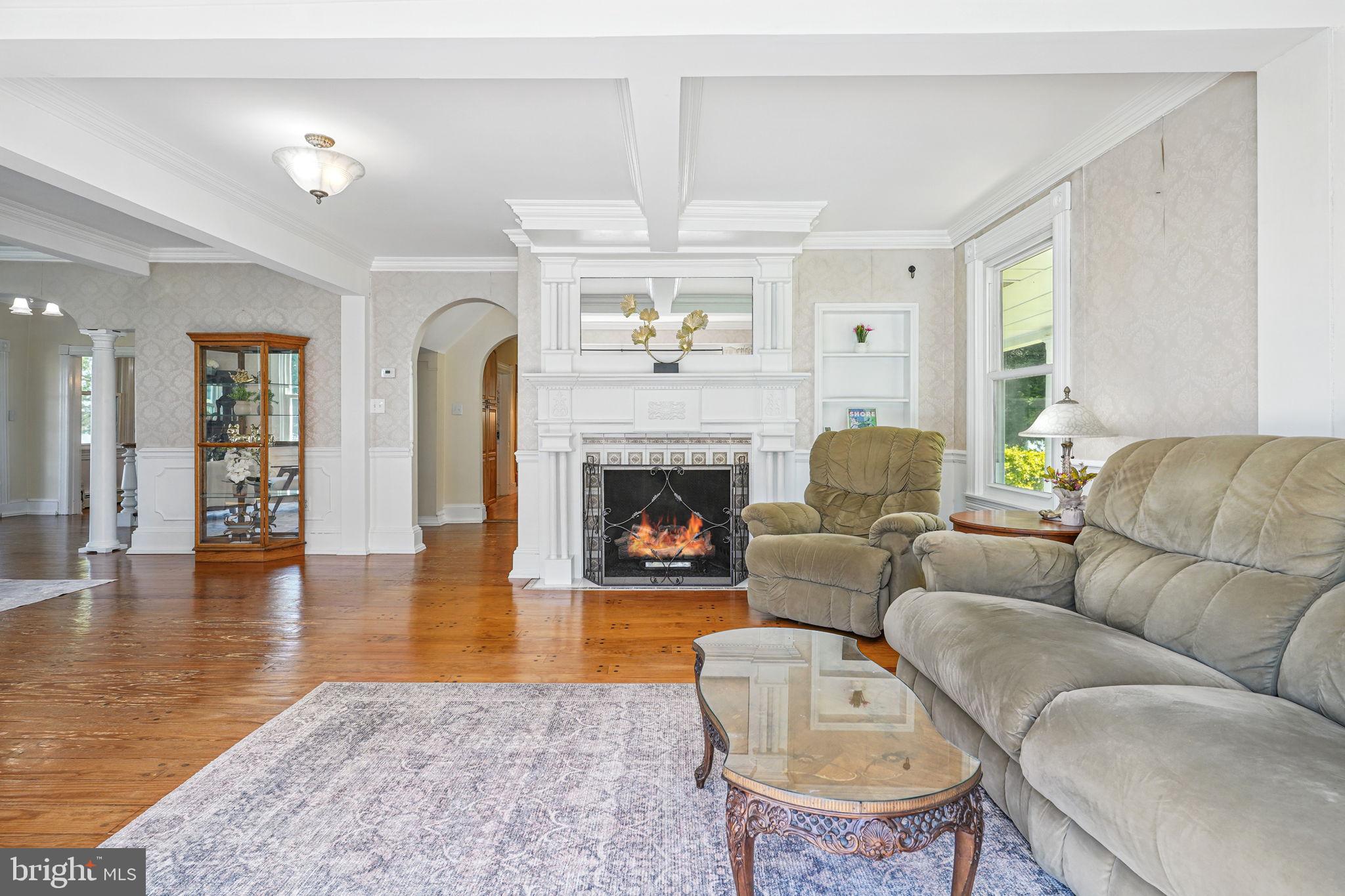 5365 Buena Vista Road Prince Frederick, MD 20678 - Photo 47 of 74 a living room with furniture and a fireplace