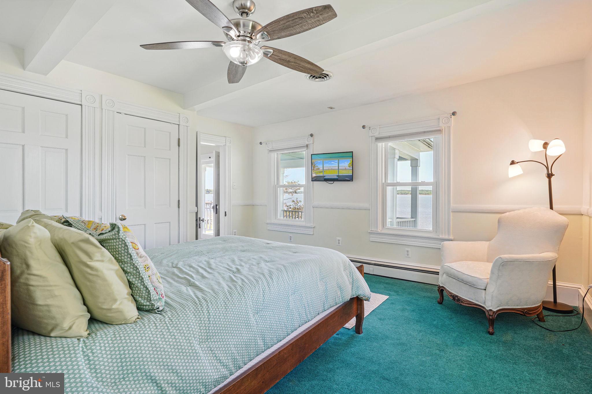 5365 Buena Vista Road Prince Frederick, MD 20678 - Photo 61 of 74 a bedroom with a bed and ceiling fan