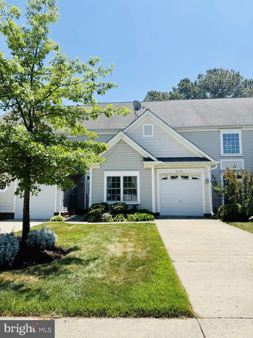 629 Ruxton Road, Unit 74 Solomons, MD 20629 - Photo 2 of 24 a front view of house with yard