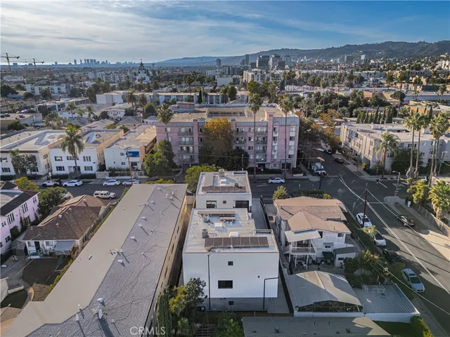an aerial view of a city with lots of residential buildings
