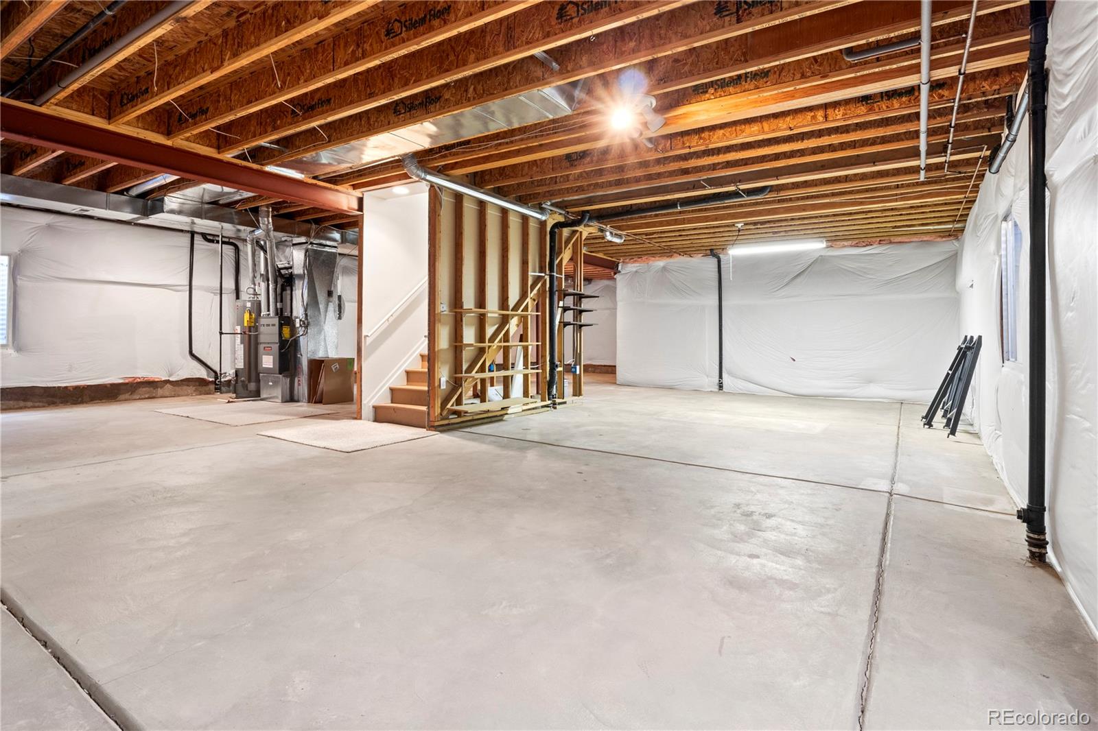 6900 West Grant Ranch Boulevard, Unit 53 Littleton, CO 80123 - Photo 22 of 31 a view of the room with wooden floor