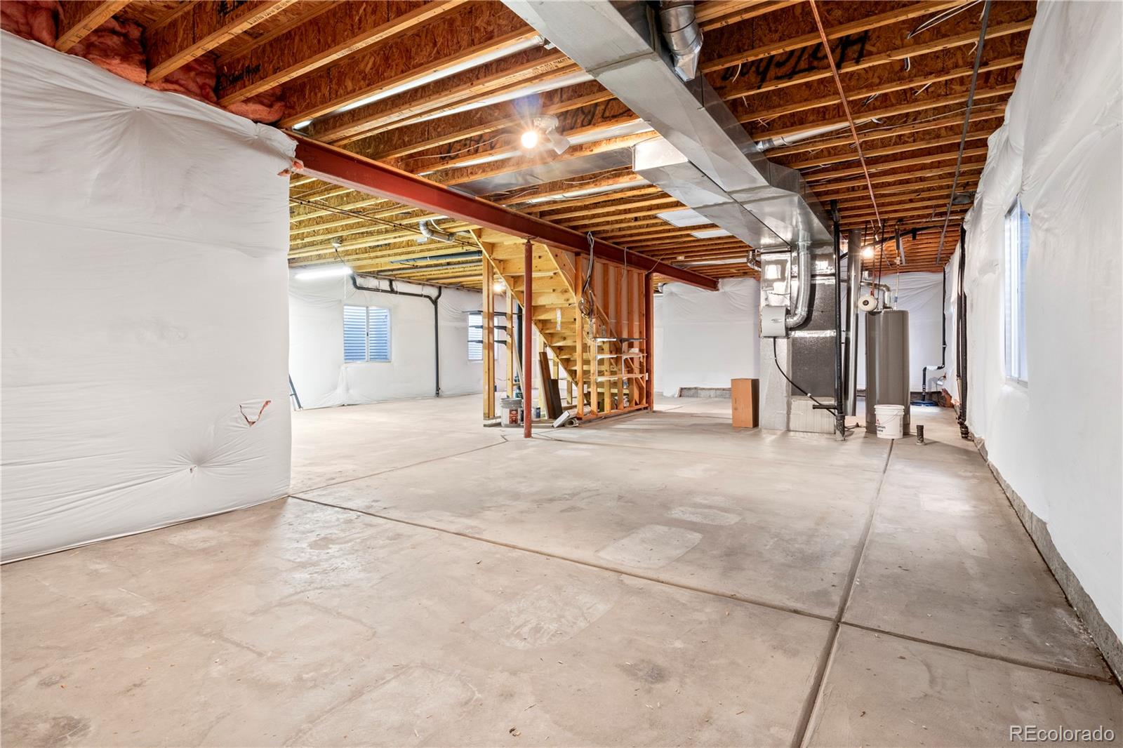 6900 West Grant Ranch Boulevard, Unit 53 Littleton, CO 80123 - Photo 23 of 31 a view of a room with wooden floor