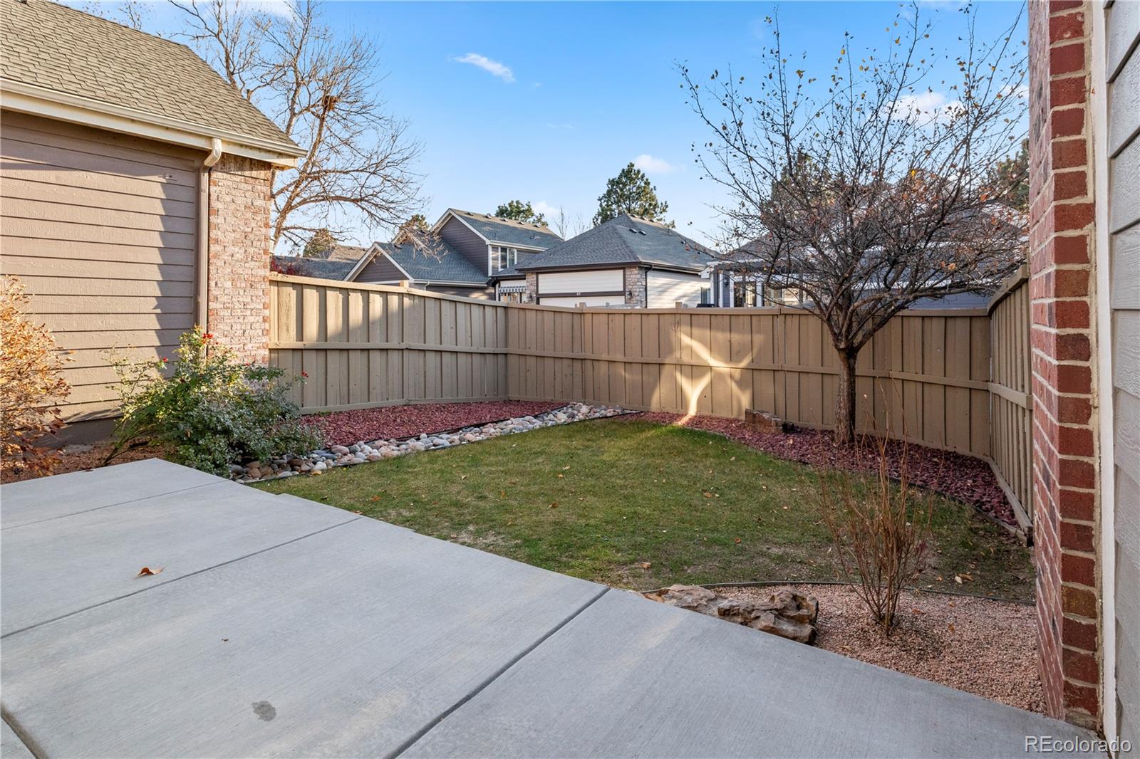 6900 West Grant Ranch Boulevard, Unit 53 Littleton, CO 80123 - Photo 26 of 31 a view of a back yard of the house